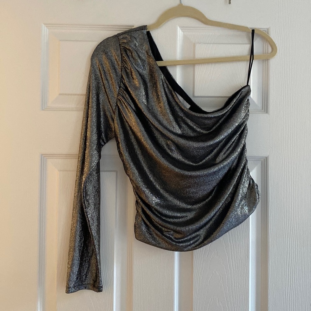 One shoulder shimmery silver top